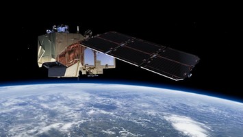 Ein Satellit im Weltall, unter ihr sieht man die Erde