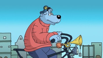 Kï¿½pt&#8217;n Blaubï¿½r auf einem Fahrrad in einem Comic