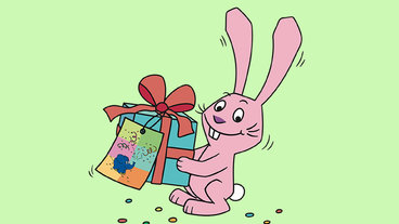Hase mit Geschenk, daran der Geschenkanhänger mit Elefant
