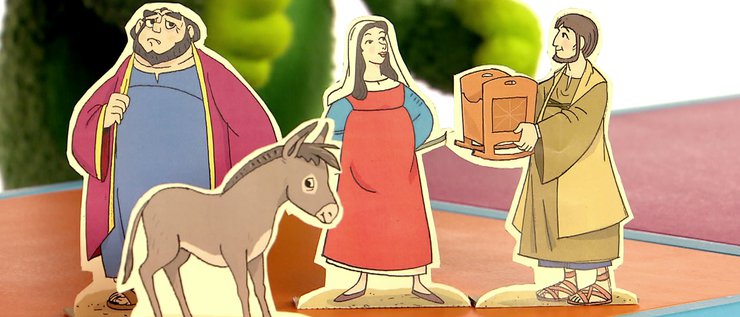 Maria, Josef, ein kleiner Esel und der Kaufmann als Pappfiguren