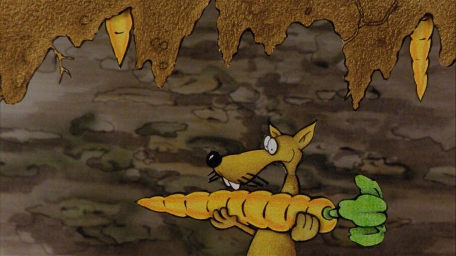 Eine gelbe Ratte hält eine große Möhre.
